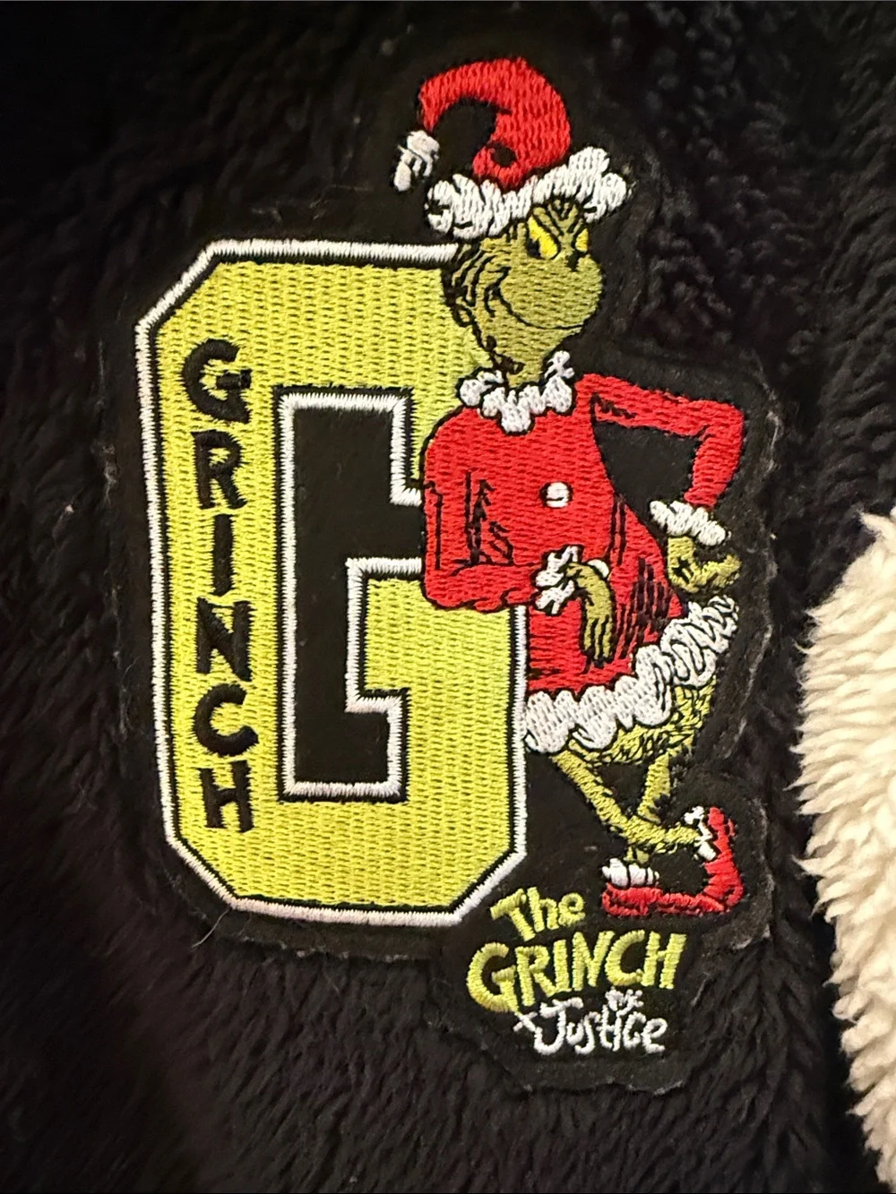 The Grinch Justice Black & White Varsity Style Jacket with Grinch Patch